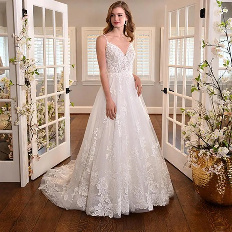 Robe de mariée grande taille robes à col en V profond rétro A-ligne longueur au sol sans manches appliques robes de mariée blanches pour invité avec tulle bouffant