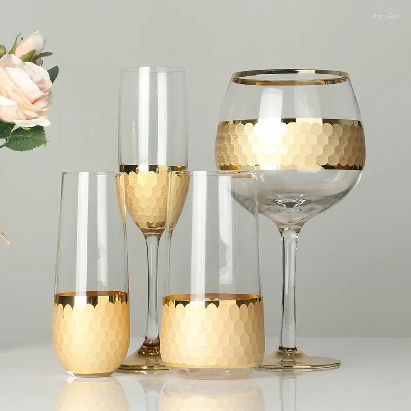 Vinglas med kreativt glas klart drickskopp tumbler champagne bägge honungskaka phnom penh whisky brandy hemvatten vatten