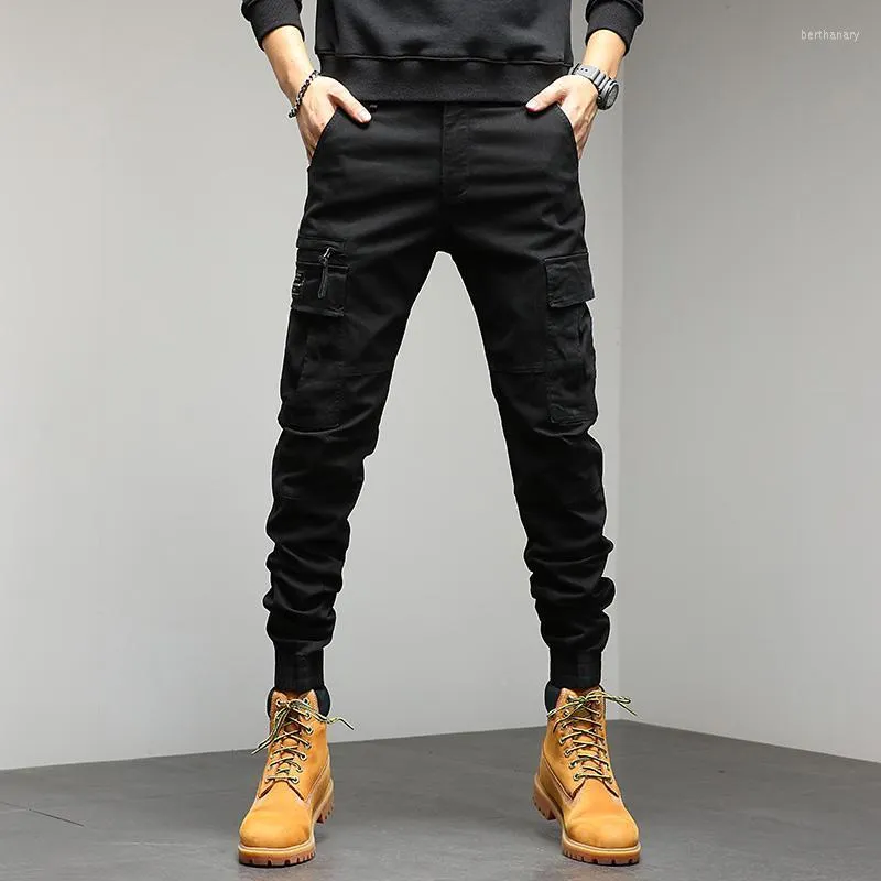 Męskie spodnie duże kieszenie swobodne spodni mody koreańsko -mody streetwear hip hop luźne dno 2023 Wintermen's Bert22
