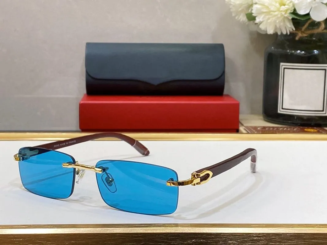 Luxury Mens Designer Solglasögon Kvinna Märke UV400 Eyewear Gold Silver Metal Rimless Frame Carti Sun Glasses Trä C Decor Eyewear Transpare