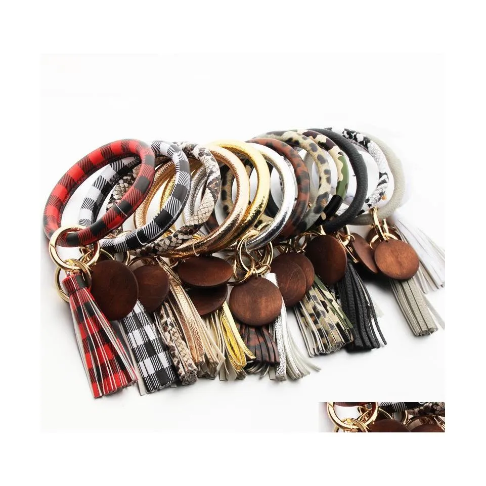 Nyckelringar av hög kvalitet PU läder armband armband Bangle Big O Loop Keychain Armband med TASSEL Handkedjor Bangles Q41FZ Drop D Dhtba