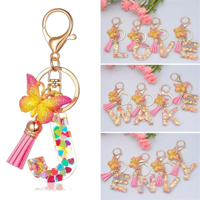 Nyckelringar A-Z 26 Alfabetet Harts Keychain med rosa TASSEL Gradient Butterfly Pendant Key Ring Women Bag Ornament Accessories Gift