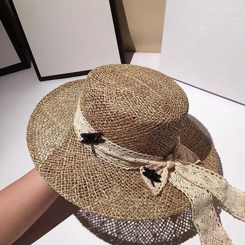 Sombreros de ala ancha Estilo Hepburn Sombrero de paja salado personalizado de alta gama para mujeres Verano Retro Flat Top Sunshade Beach Chapeu Feminino Scot22