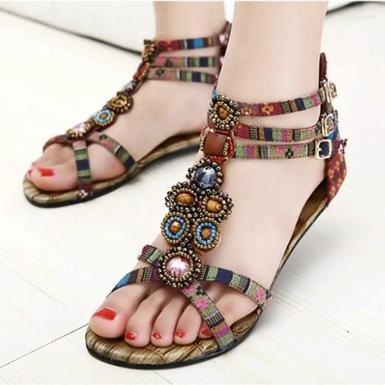 Sandaler 2023 Summer Designer Gladiator Kvinnor Rhinestone Beading Sandalias Bohemian Style SMRED BAND PRINT LADIES SHOES