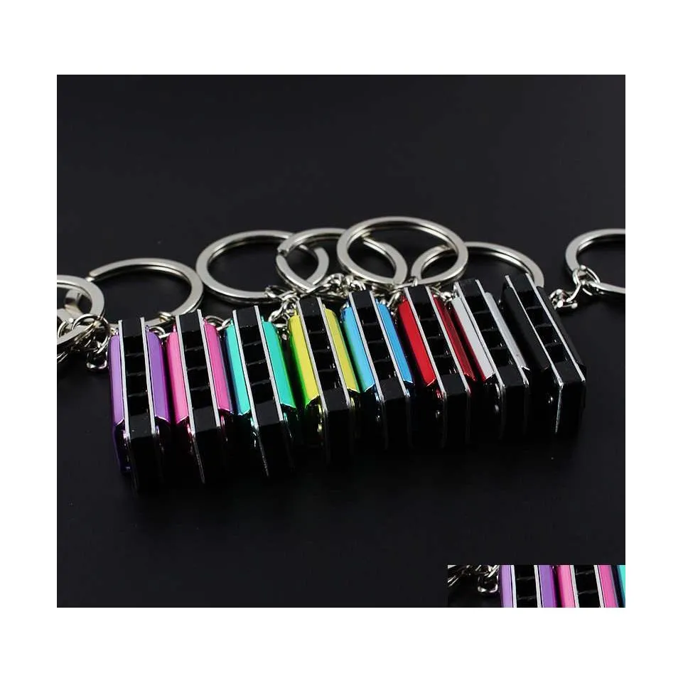 Nyckelringar 100st/Lot Metal 4 Holes Mini Harmonica Keychain Children Toys Keyring Kids Gifts Chain Bags Mobile C3 Drop Delivery Jewelr Dhnou