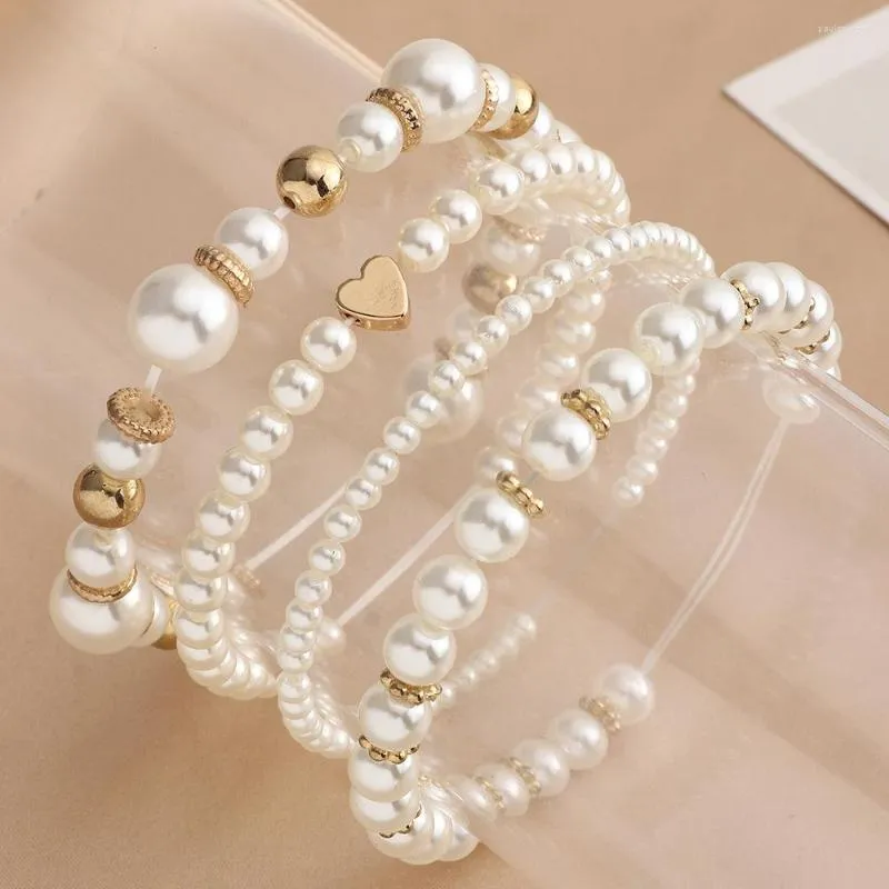 Set di braccialetti a forma di cuore con perle d'imitazione per le donne, gioielli per feste eleganti