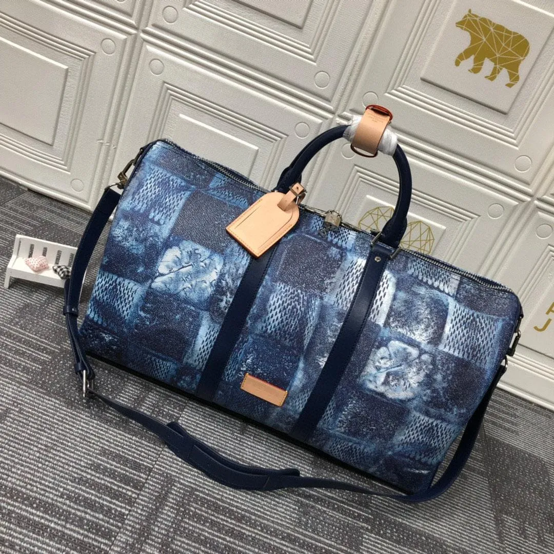 Luxury Designer Bag äkta läderbagage stor kapacitet duffle väska helgens semester resväskor sport utomhuspaket mjuksidig resväska messenger väska handväskor