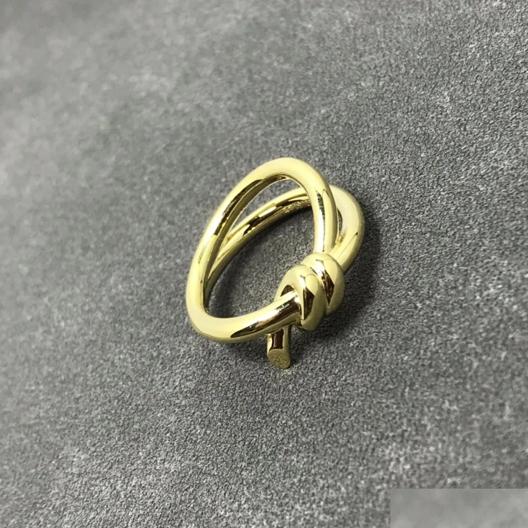 Band Rings Designer Kadınlar Ring Moda Düğümlü Titanyum Çelik Golde Golde Gold Sier Düğün Partisi Hediyeleri Takı Damlası Teslimat Dhwur