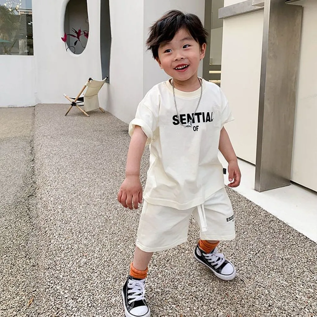 2pcs Toddler Boy Basic Textured Short-sleeve White Tee and Shorts Set