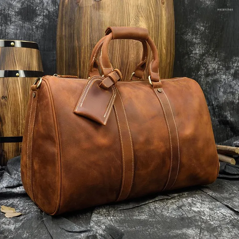 Duffel Bags Horse Duurzame gekke lederen mannen vrouwen reizen retro hoogwaardige grande hand duffle cowhide Boston schoudertas