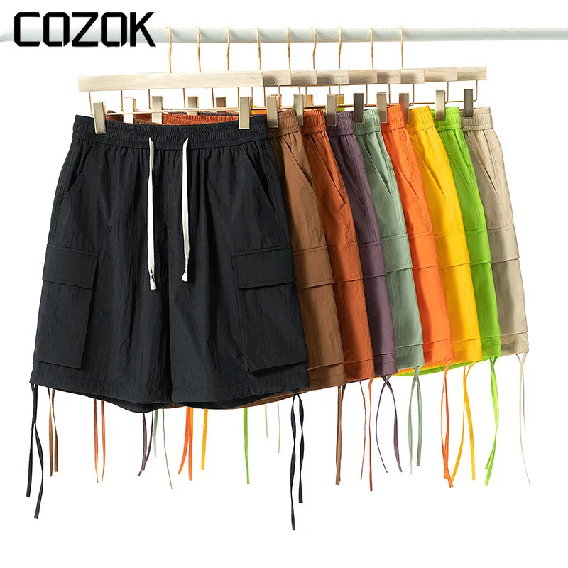 Mäns shorts 2023 Waterproof Cargo Japan Style Casual Loose Half Pants Men Workwear MultiCocket Large Underpants Street 230802