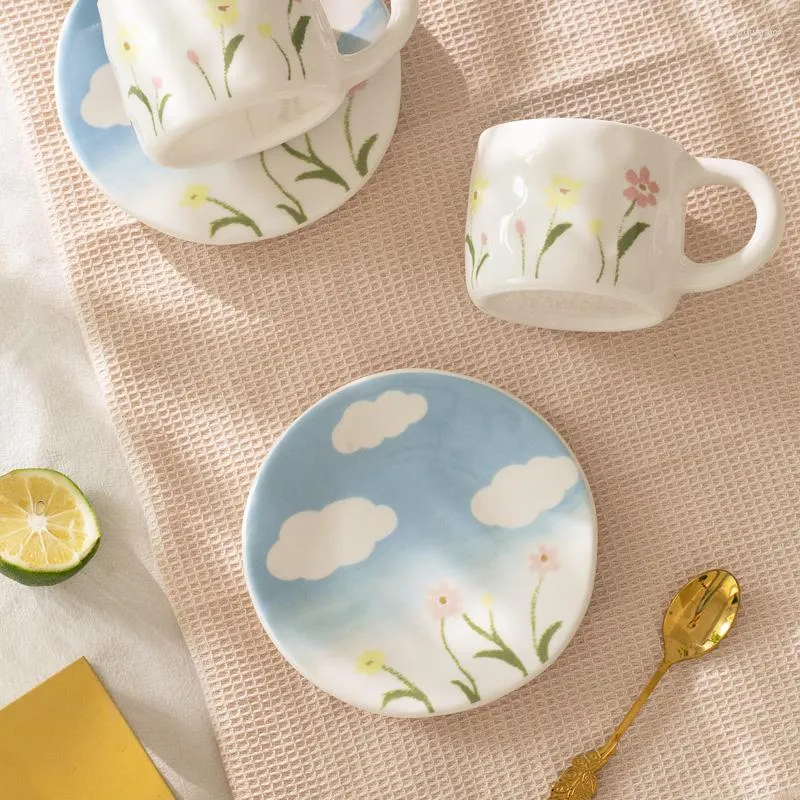 Koppar Saucers Spring Blue Sky och White Clouds Illustration Vind Ceramic Coffee Korea Advanced Design Sense.