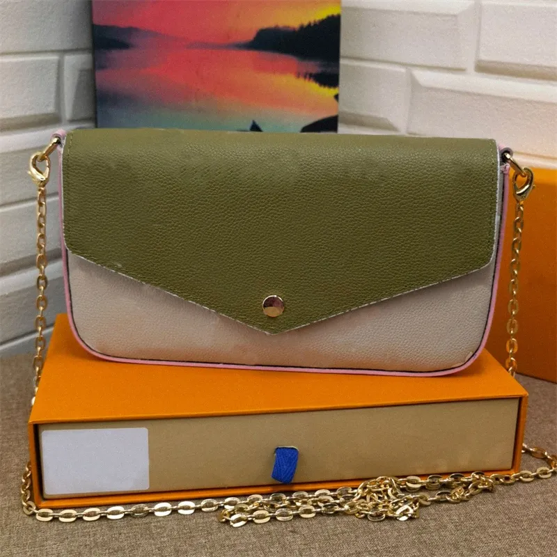 16 STRAP POCHETTE 18 IN BLACK SUPPLE CALFSKIN GOLD HARDWARE main image 1