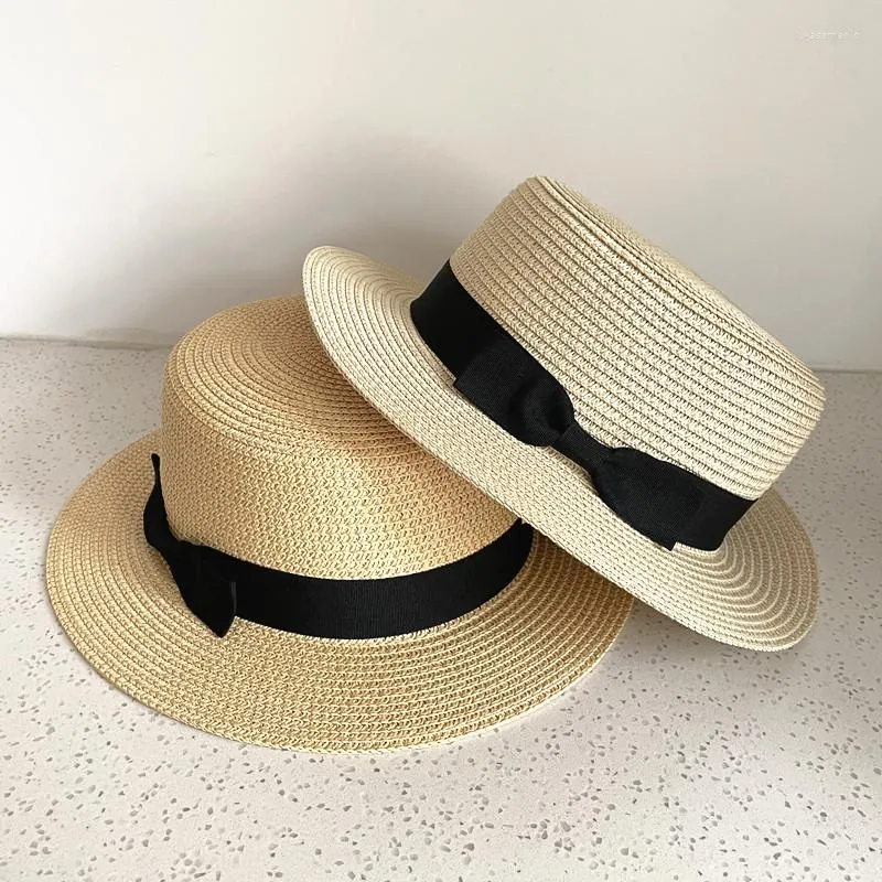 Breda randen hattar Sommar för kvinnor Sun Hat Beach Ladies Boater med Bowknot Casual Straw