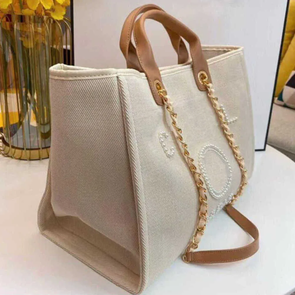 Mode féminine Sacs de soirée de luxe Pearl Beach Sac à main Marque Designers Femmes Sac fourre-tout Grande capacité Femme Sac à dos Petits packs portables Shopping Sacs à main 8GZO