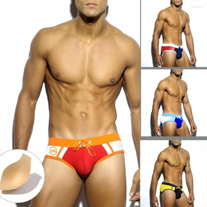 Mäns badkläder europeiska och amerikanska sommar sexig färgmatchning triangel simning stammar mode män bikini strand underkläder