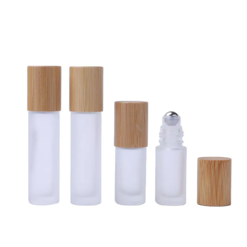 Frasco roll-on de óleo essencial fosco 5ml 10ml tampa de bambu recipiente de perfume de vidro com bola de metal JL1886