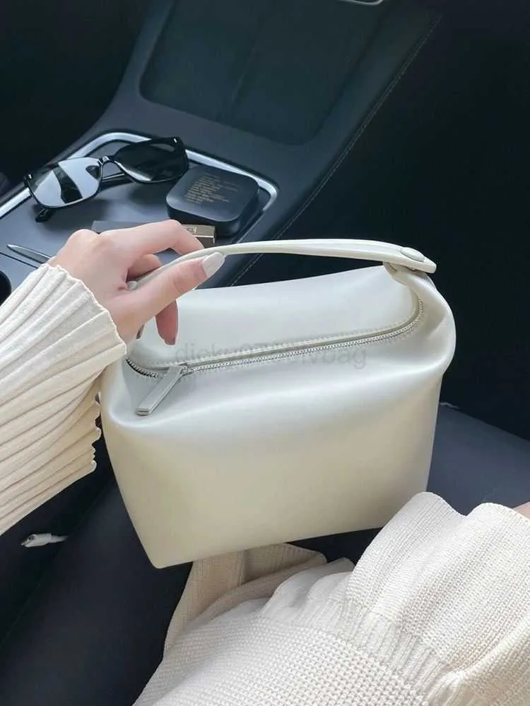 The Row lunch box bag is extremely minimalist and niche design. High quality handbag women s bag The Row Bag