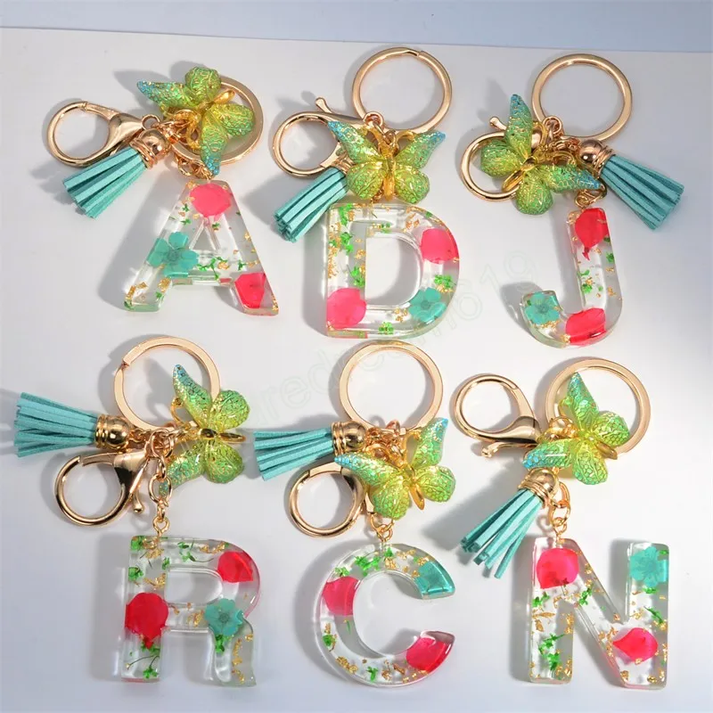 Fashion Letters A to Z Dry Flower Keychain Butterfly Tassel Pendant Keyring for Women Car Key Holder Handbag Accessories Gift