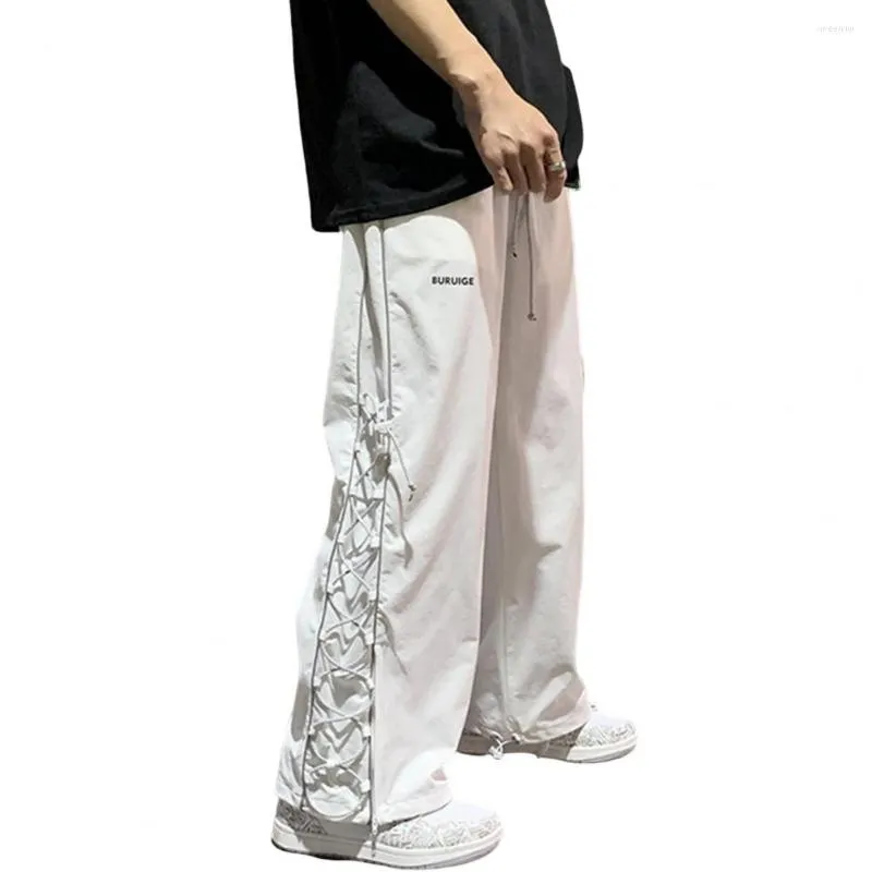 Pantaloni da uomo Casual a vita media elastico in vita incrociato laterale con lacci polsini con coulisse pantaloni sportivi da uomo estate sottile Hip Hop Cargo