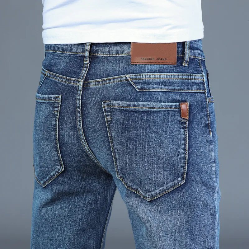 Jeans da uomo Primavera Autunno 2023 Smart Business Fashion Straight Regular Pantaloni in denim elasticizzato blu Classic Men Plus Size 2840 230804