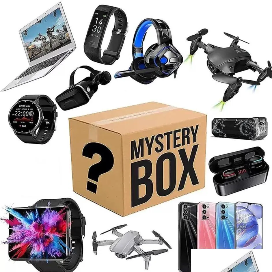 Haut-parleurs portables Mystery Box Electronics Boîtes aléatoires Cadeaux surprise d'anniversaire Chanceux pour les Adts tels que Bluetooth Head307U Drop Deliver Dhij0