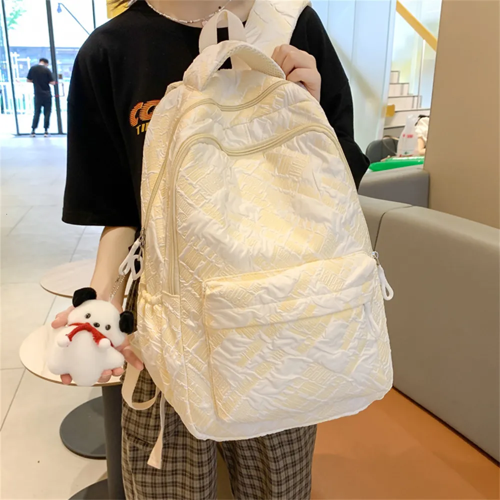 Mochila escolar feminina de náilon casual carta escolar japonesa INS mochila para estudantes do ensino fundamental coreana bolsa leve e minimalista 230804