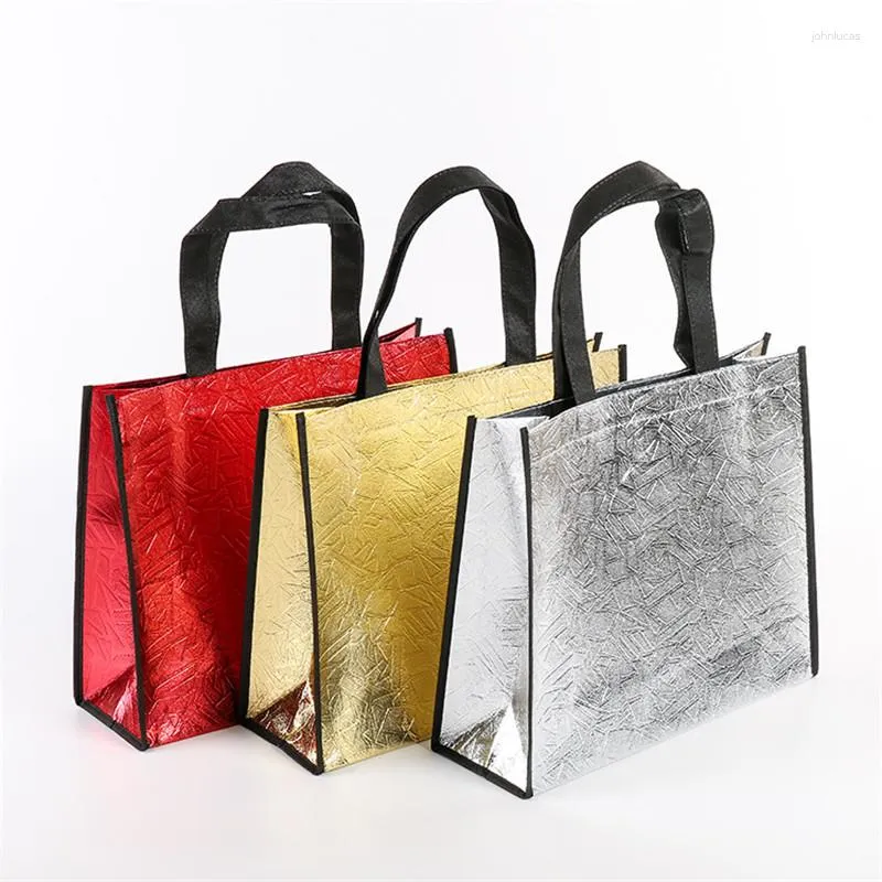 Confezione regalo 100 Pz / lotto Borsa in tessuto non tessuto laser grande di alta qualità Imballaggio per abbigliamento per lo shopping tenuto in mano 32x12x27 cm / 40x12x32 cm