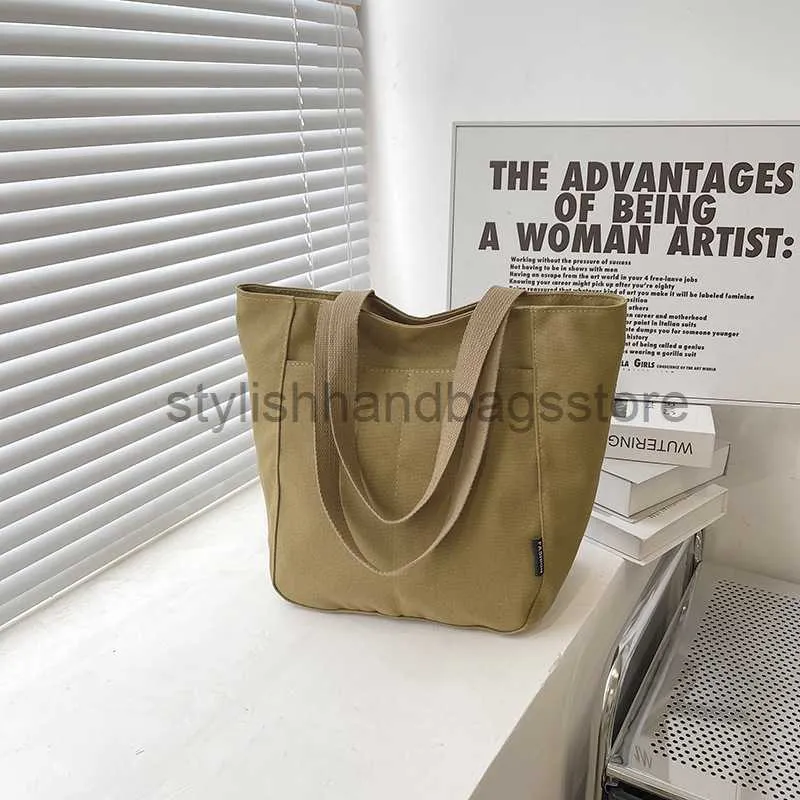 Totes 2023 Nuevo bolso de ocio Tendencia de mujer Bolso de clase de estudiante universitario Bolso de hombro coreano de gran capacidad Bolsos de mano elegantes