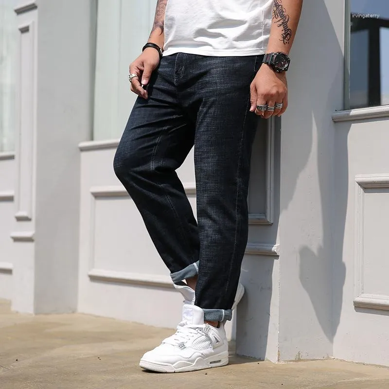 Мужские джинсы Прибытие мода Супер большие мужчины свободны от удобного тонкого размягчения повседневной длины. Плюс размер 384042 43 44 45 46 48