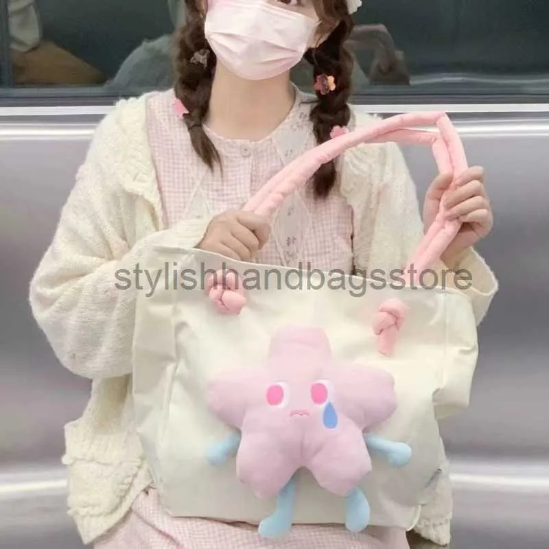 Totes söt dukväska ny 2023 Yamano Sakura Fly Shoulder Bag Kvinnors stora kapacitet mångsidig handbagstylishhandbagsstore