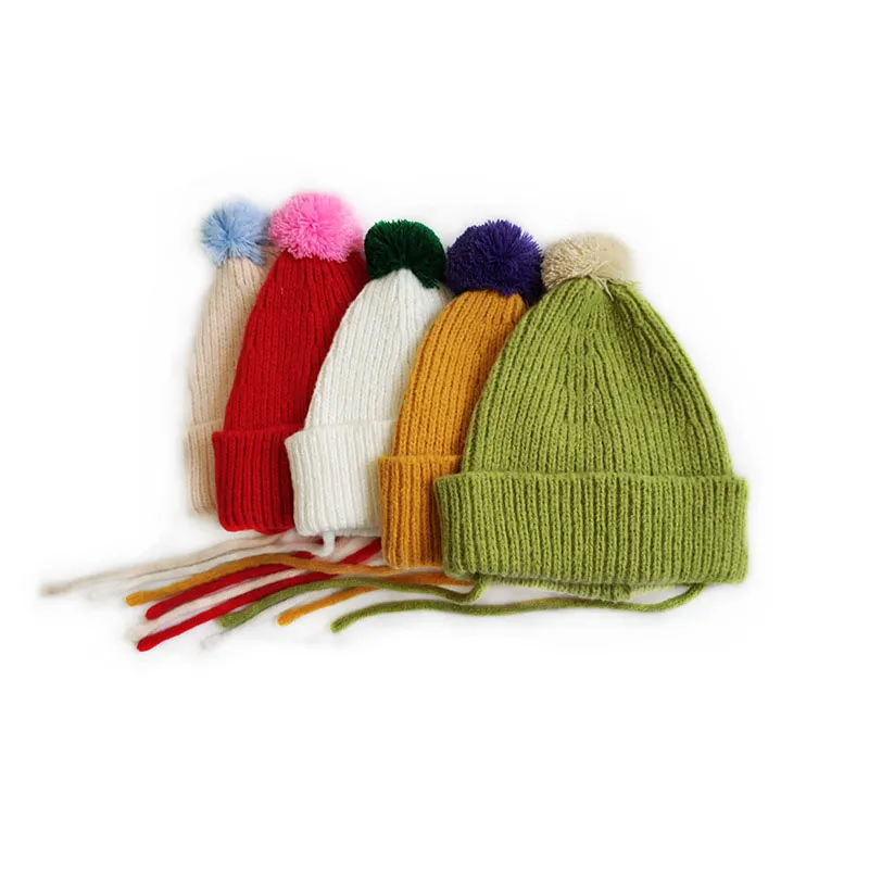 M592 Otoño Invierno sombrero para niños tejido Color caramelo lana bola calavera gorras niños cálidos gorros con cordones niños niñas sombreros casuales