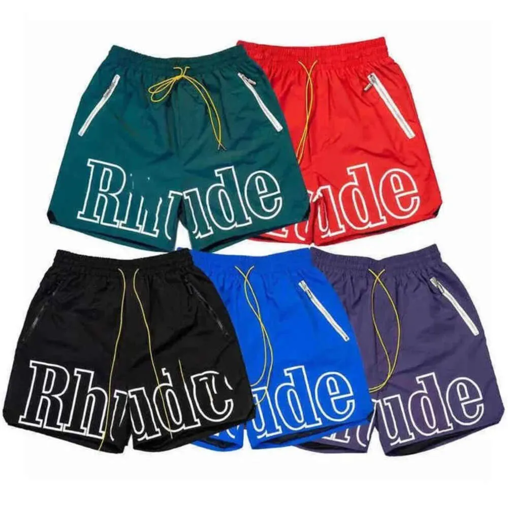 2023 New Rhude Mens Mesh Shorts Moda Uomo Donna Casual Skateboard riflettente Hip Hop Beach Rhude Pocket Bordo bianco di alta qualità4