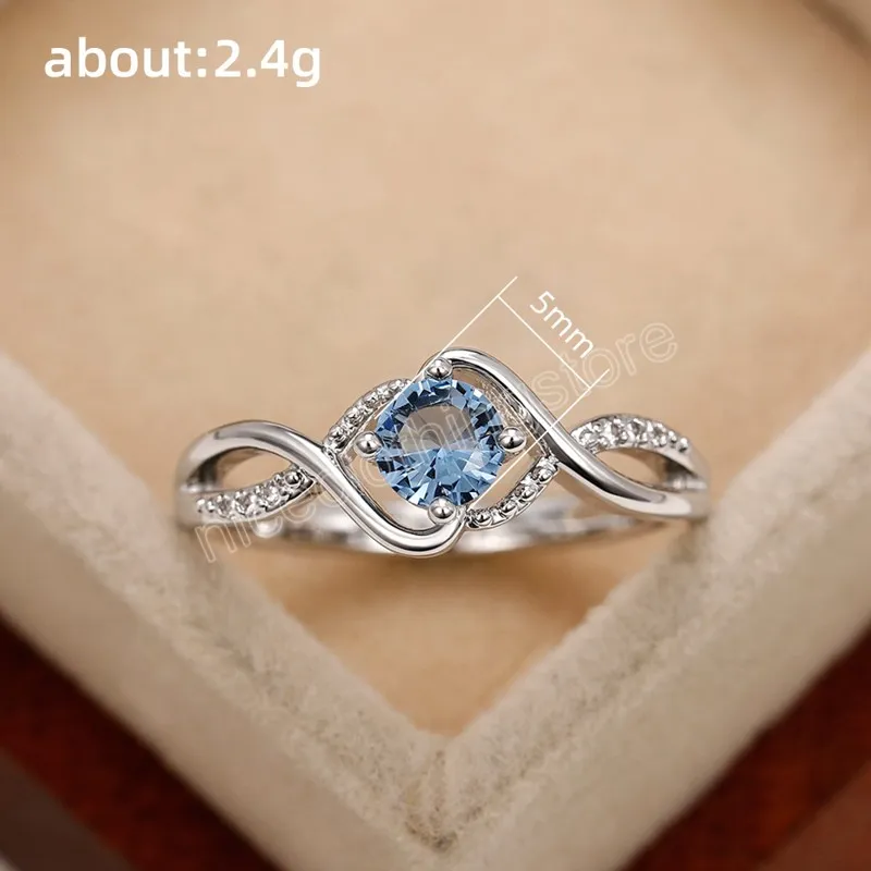 Twist Ontwerp Blauwe CZ Ringen Hoge Kwaliteit Zilveren Kleur Trouwringen Vrouwen Ringen Unieke Verjaardagscadeau Mode-sieraden