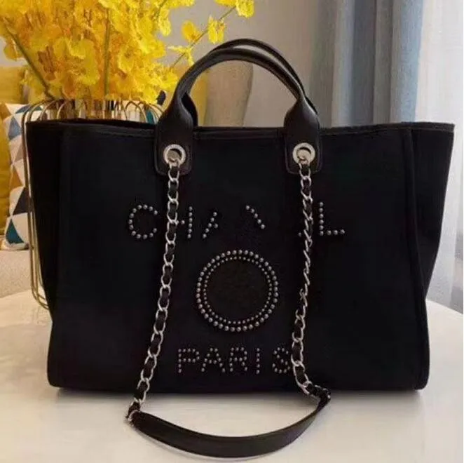 Diseñador Clásico Moda Bolsos de noche Bolso de lujo Perla Etiqueta de marca Mochila Bolsos de playa para mujer Monedero Bolso de mano de lona para mujer Señoras 05jz