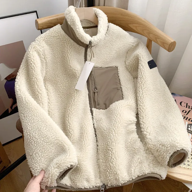 2023 Manteau de mode printemps et automne nouvelle fermeture éclair explosive col montant lâche couple poche coupe-vent manteau chaud en laine d'agneau tendance féminine manteau en pierre