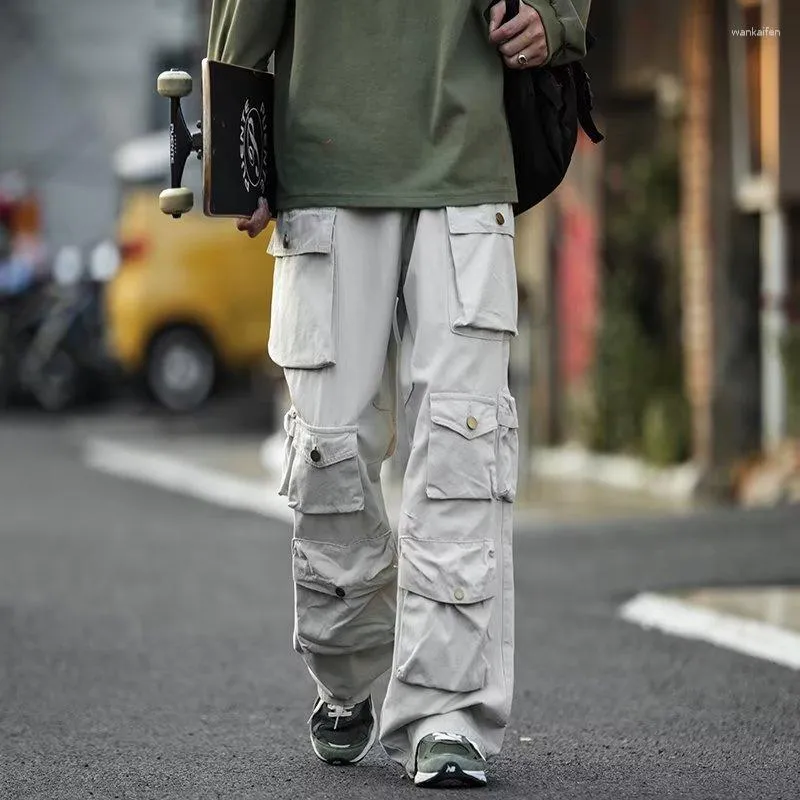 남자 바지 패션 남자 느슨한 바지 한국 다목적 남성화물 세련된 스트리트웨어 부드러운 통기성 직물 다중 주머니