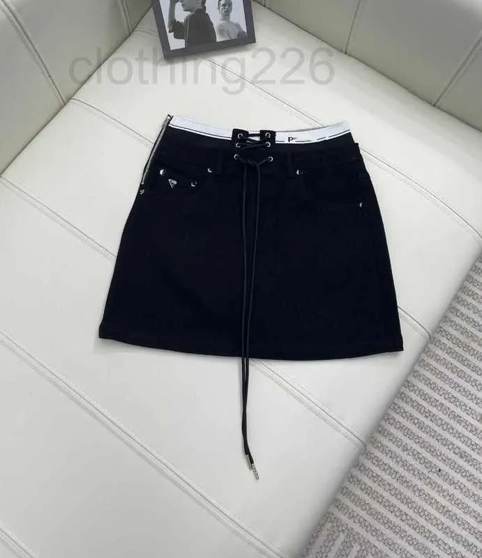 Kjolar designer 23 sommar ny sexig stil temperament ålder reducerande bokstav band casual wrap höft stängning kort kjol xllg