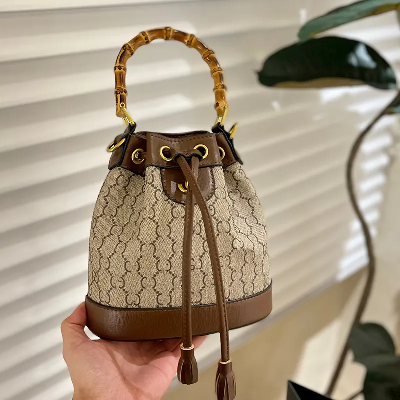 bolso de mano Diseñador de lujo Bolsos de cubo de bambú bolso de mujer monederos marrón Titular de la tarjeta con cordón Bolso de hombro de cuero genuino hombres bandolera bolsos de moda Bolso