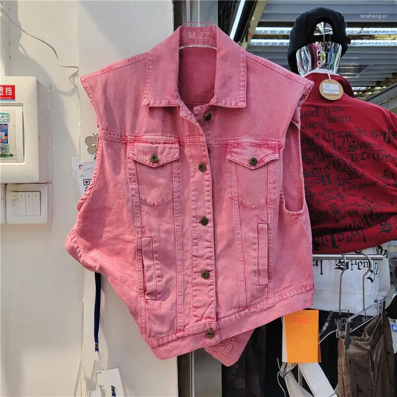 Kvinnors västar våren koreansk mode rosa denim väst kvinnor förlorar kort oregelbunden cowboy midja stora fickmärmlösa jeansjackor kvinnliga