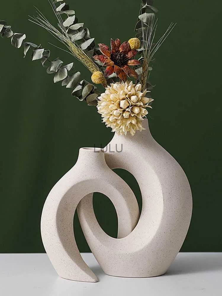 Vasi di ceramica in stile europeo Creative White Simple e di fascia alta Decorazioni per la casa Decorazioni di fiori HKD230810