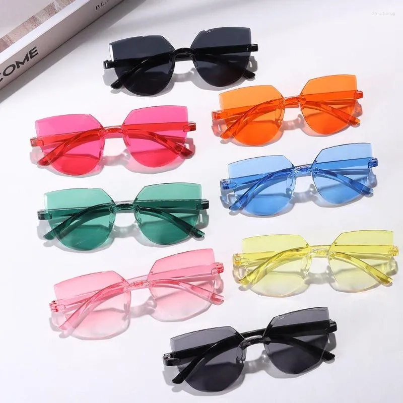Okulary przeciwsłoneczne kota oko bez krawędzi dla kobiet modne przezroczyste cukierki kolor okular