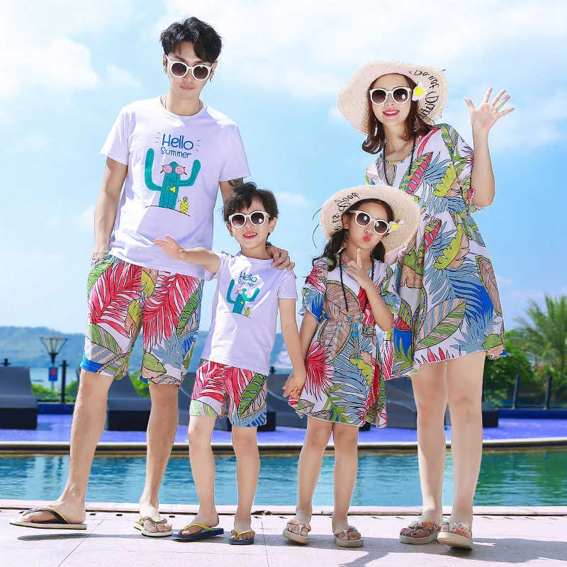 Family Matching Solid Spaghetti Strap Lace Cotton Dresses and Striped Short-sleeve Tops Sets