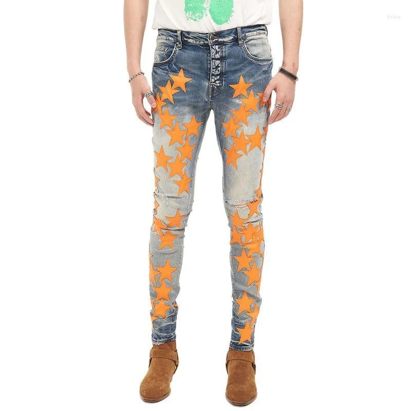 Męskie dżinsy Am marka Man Pants Streetwear Skórzana pomarańczowa gwiazda plaster dżins moda szczupła fit Ripped Men Spodni harajuku