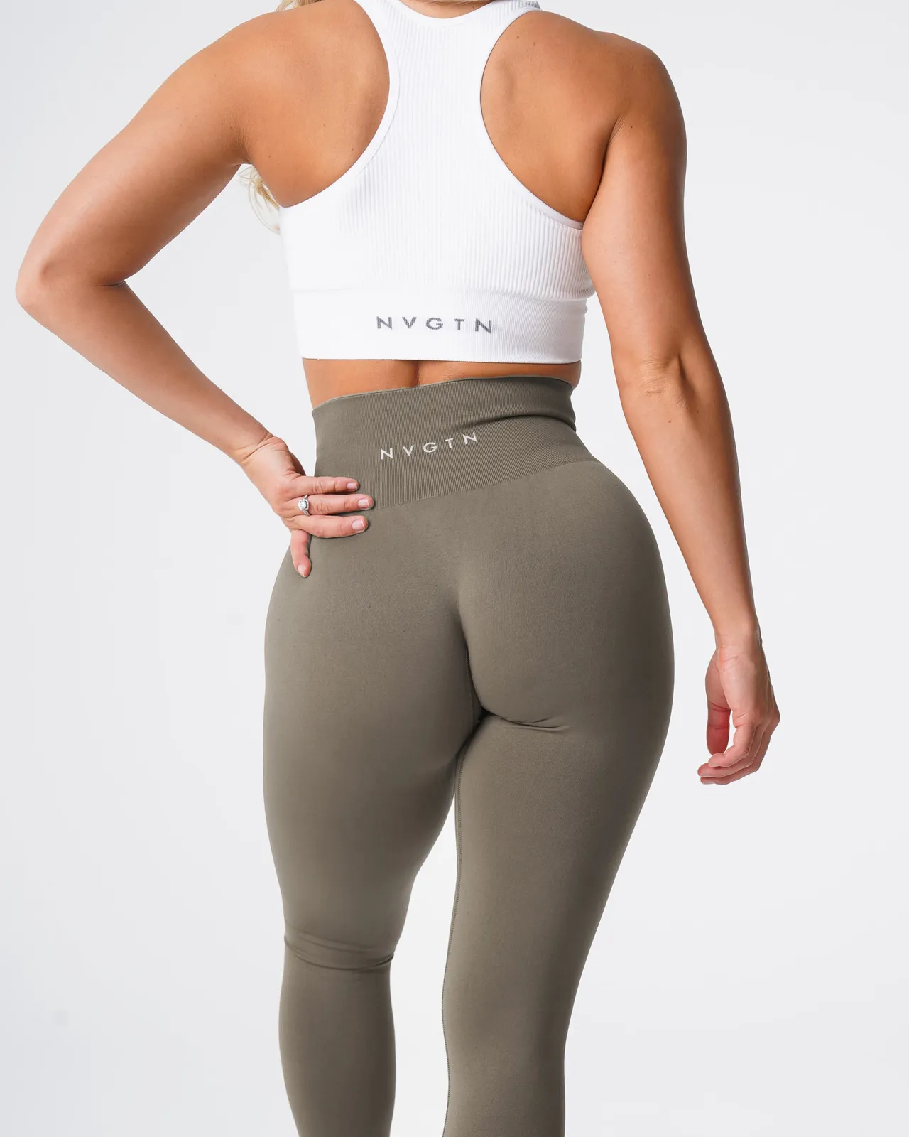 NVGTN Womens High Waisted Spandex Crossover Leggings Solid