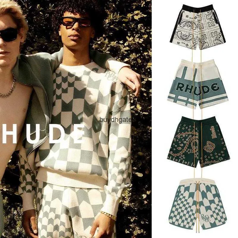 Fniy Men's and Women's High Street Shorts Fashion Brand Rhude 2023 Letter slogan Cashew Flower Plaid broderad dragsko lös stickad kvartal