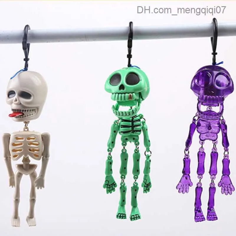 Pull Toys New Halloween Horror Skeleton Spoof Toys Plastic Horror Fluorescent Small Skeleton Keychain Pull Ghost Gag Toys Z230814