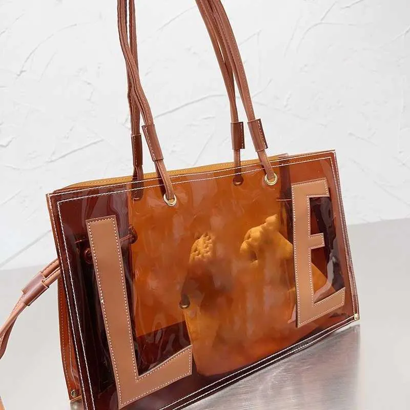 Le Brown Jelly Bag Bag Прозрачная дизайнерская сумка сумки с большими мощностью дизайнеры сумочки винтажные буквы для печати сумок для торговли женским пляжным пакетом 230711