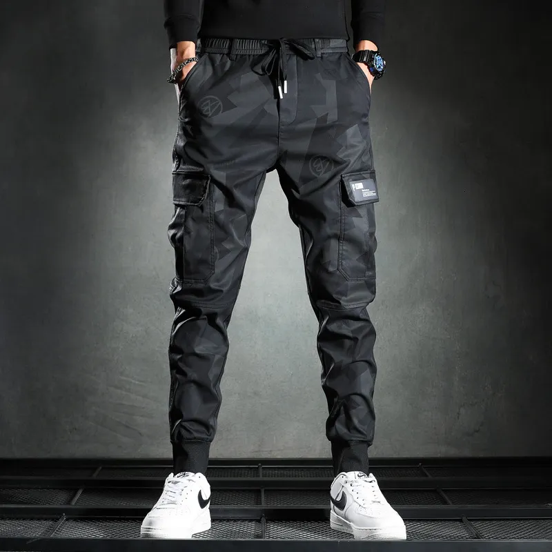 Pantaloni maschili uomini uomini mimetizzati elasticità pantaloni cargo militari che colano a più tasche pantaloni da jogger casual 230811