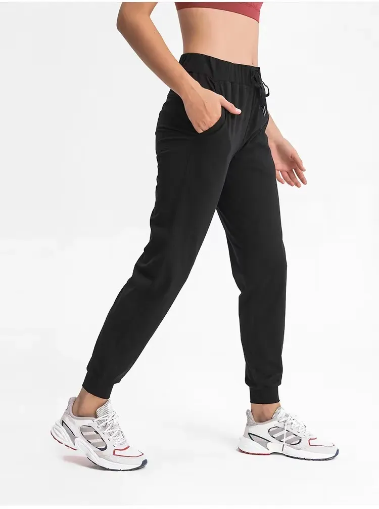 Hoge taille yogabroek Sport vrouwen snel droge broeken dames trekstring sportkleding vrouw gym sport casual losse fitness hardloop leggings zijzakken zakken